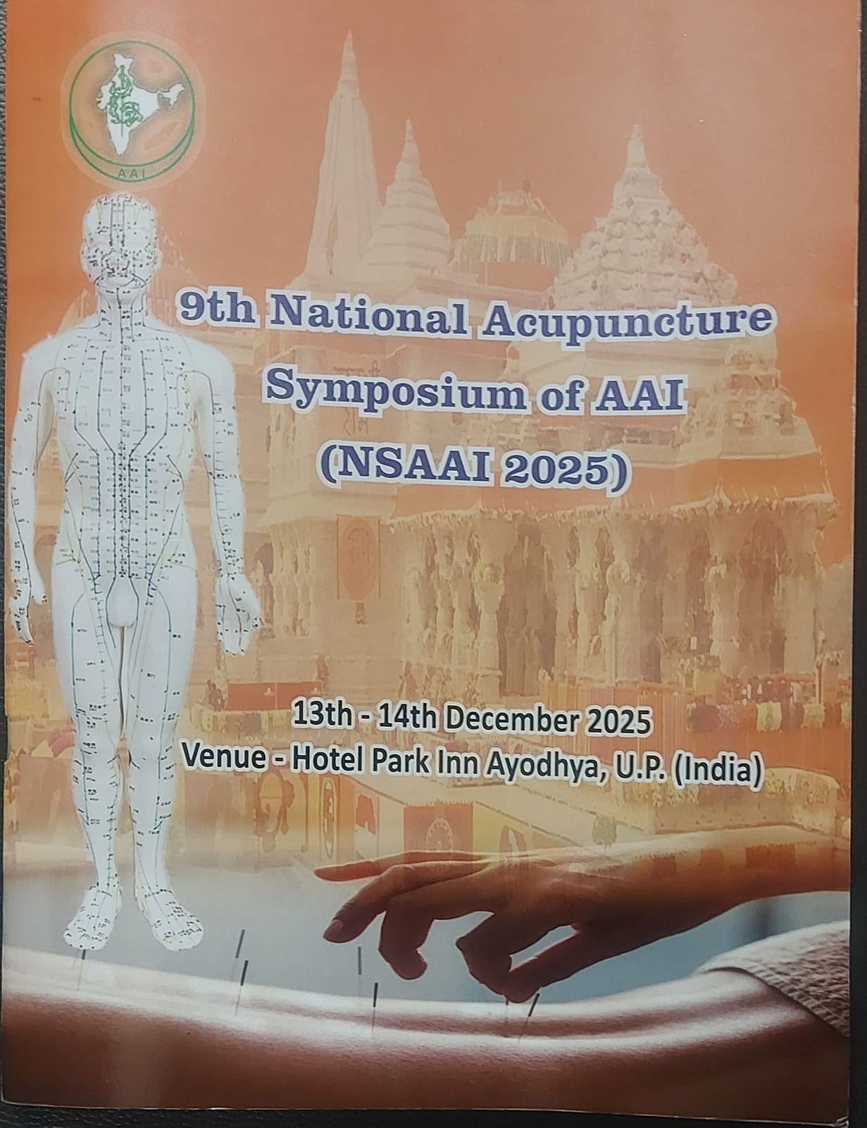 Cover of the NSAAI 2025 souvenir book — 9th National Acupuncture Symposium of AAI, Hotel Park Inn Ayodhya